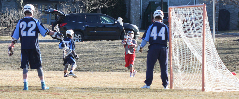 Hilbert Slips By Men's Lacrosse