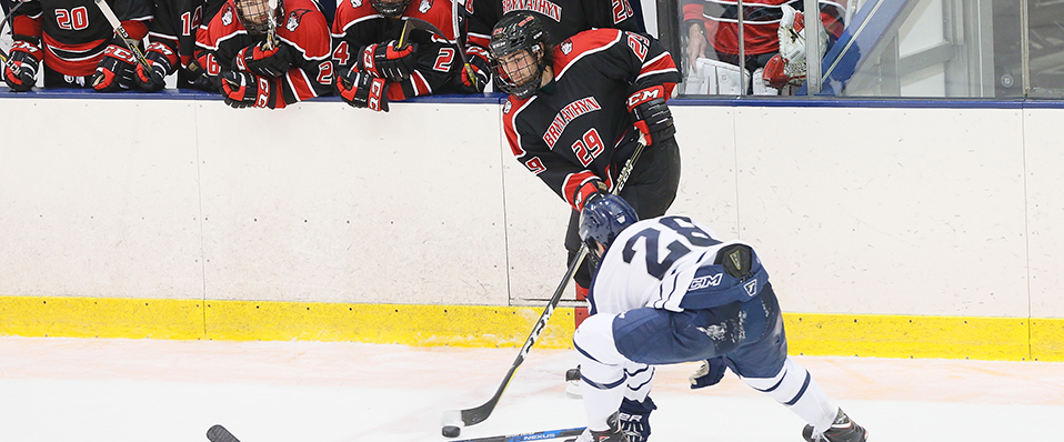 Ulmer's OT goal gives ice hockey first win of NCAA era