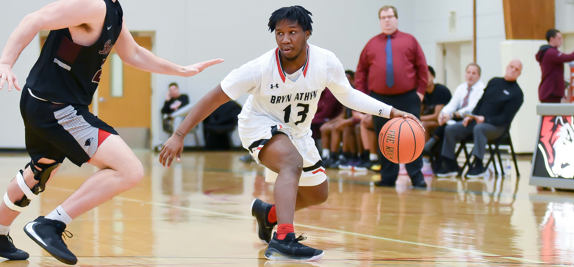 Late surge leads men's basketball to 75-66 win over Rosemont