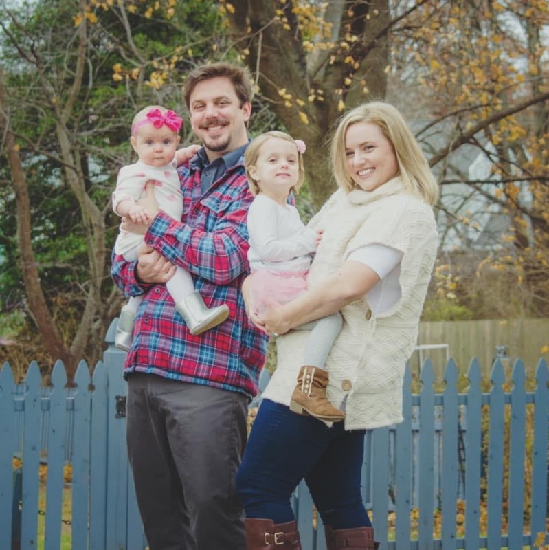 Head coach Katie Fitzgerald with her husband Michael and daughters Hartlee (left) and Lennon (right).