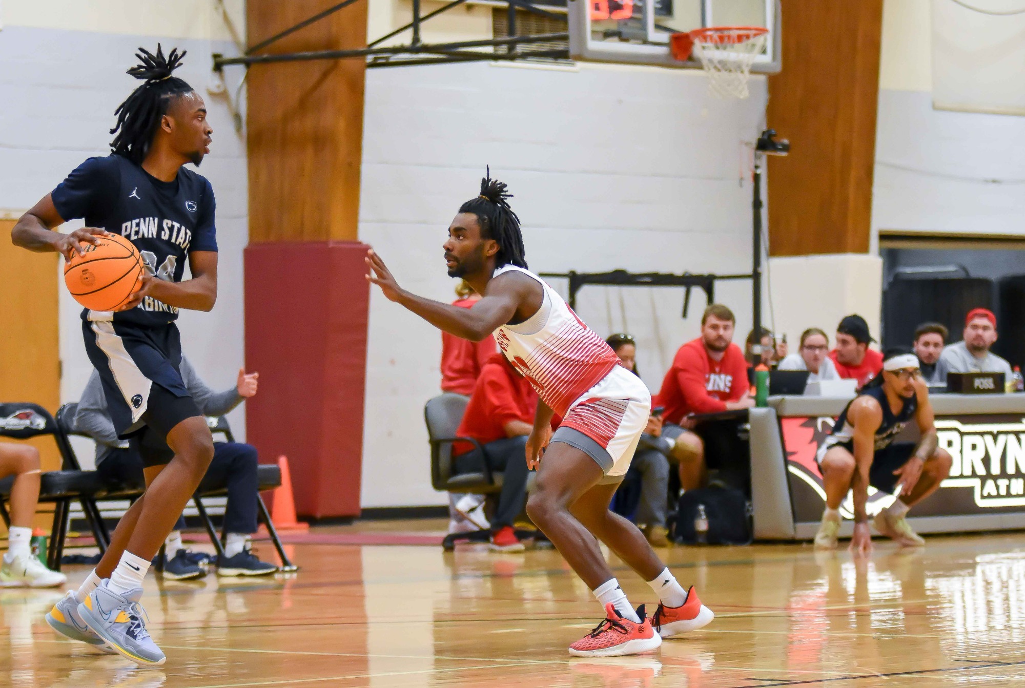 Men's Basketball takes tough road loss at Rosemont