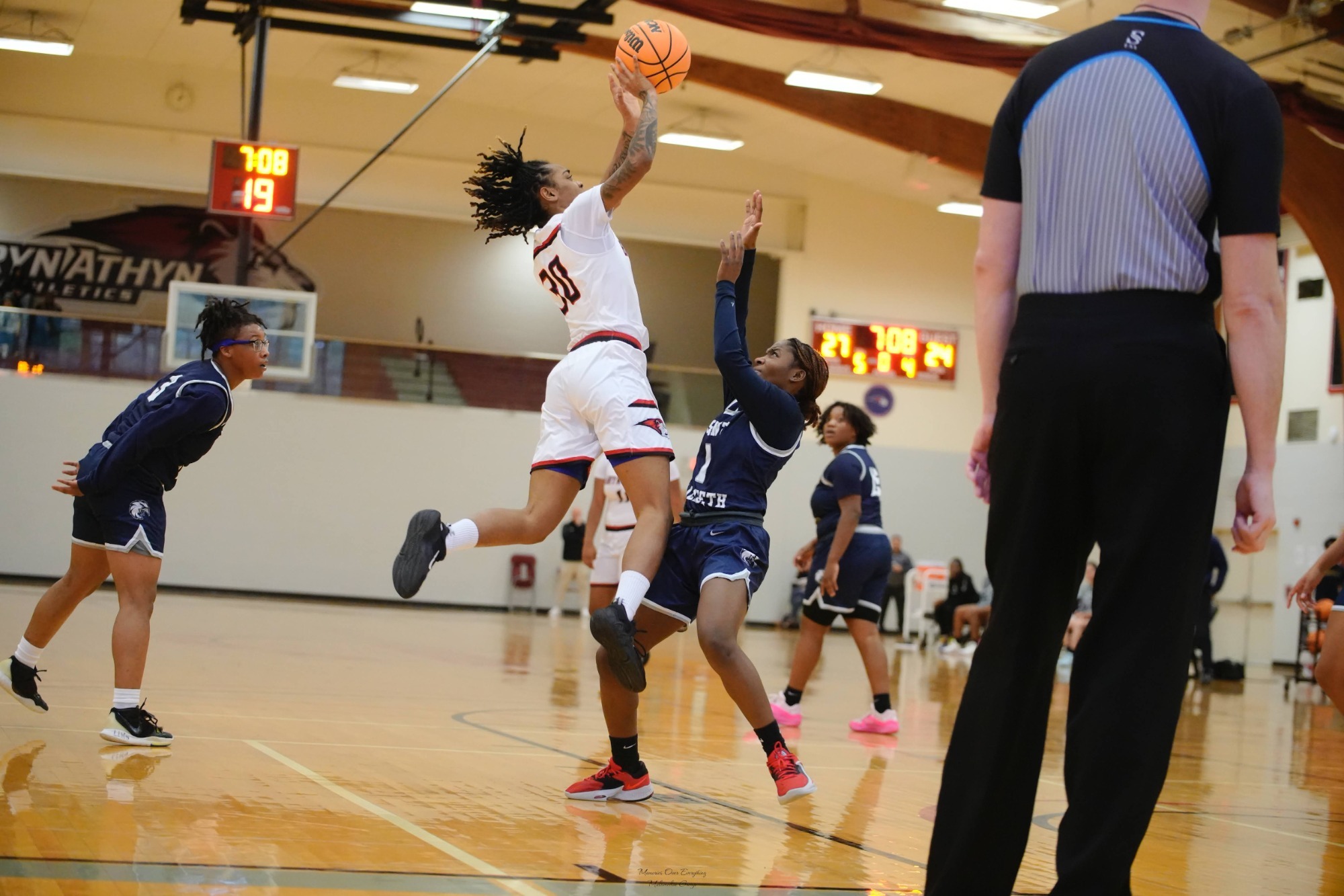 Women's Basketball wins first playoff game as program