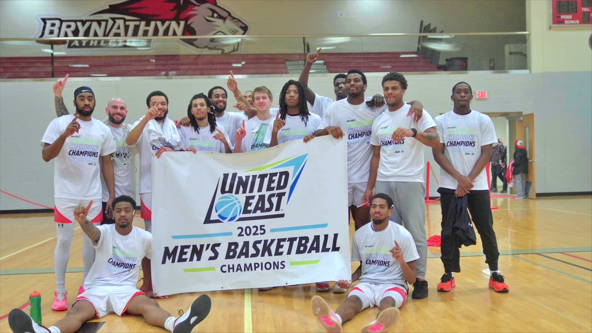 CHAMPS! Men's Basketball capture first conference championship in program history